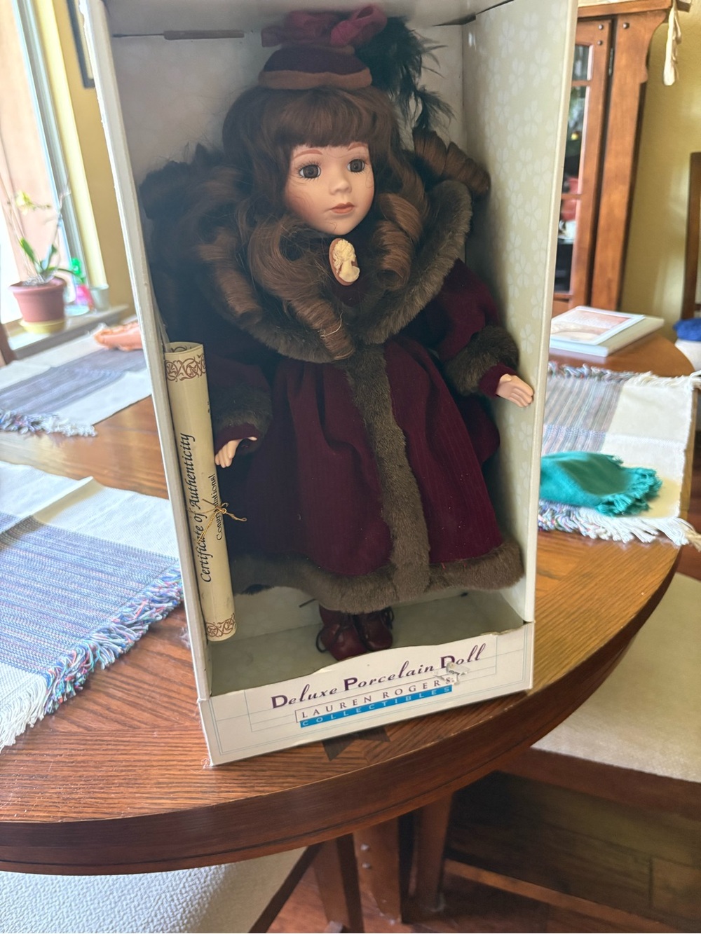 Deluxe Porcelain Doll in Burgundy Coat